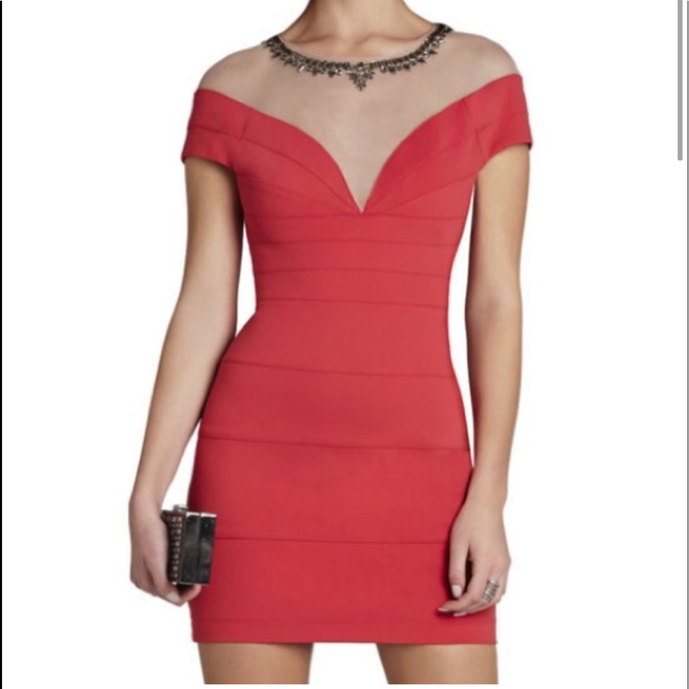 A brand new, with tags attached, reddish/orange BCBG Maxazria dress.